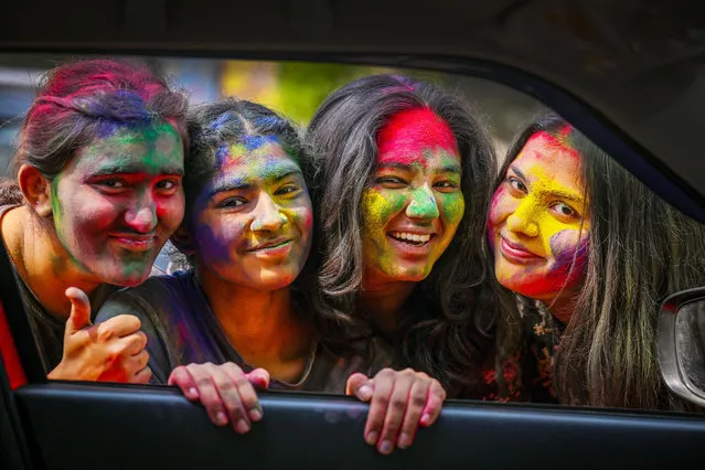 Students play with colours ahead of Holi festival, at outside the Matasundari College, ITO on March 21, 2024 in New Delhi, India.(Photo by Raj K Raj/Hindustan Times via Getty Images)