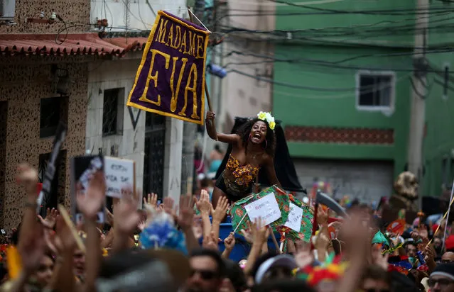 Revellers takes part in the annual block party Cordao de Prata Preta during carnival festivities in Rio Janeiro, Brazil February 25, 2017. (Photo by Pilar Olivares/Reuters)