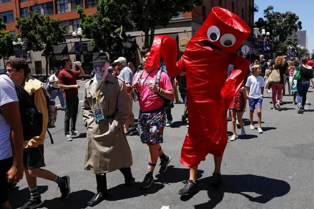 A person in a costume walks down the street at Comic Con International in San Diego, California, U.S., July 19, 2019. (Photo by Mike Blake/Reuters)