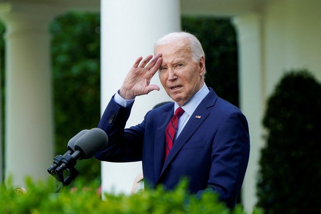 U.S. President Joe Biden delivers remarks at a reception celebrating Asian American, Native Hawaiian, and Pacific Islander Heritage Month, in the Rose Garden of the White House, in Washington on May 13, 2024. (Photo by Elizabeth Frantz/Reuters)