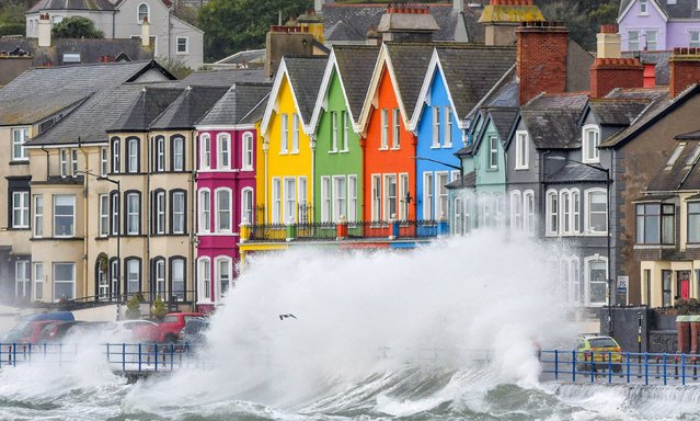 Waves crashing against the harbourside in Whitehead, County Antrim, Northern Ireland on April 6, 2024, as Storm Kathleen sweeps in from the west. (Photo by Bill Guiller/PA Wire)
