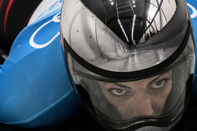 Austria's Janine Flock competes in the women's skeleton event at the Yanqing National Sliding Centre during the Beijing 2022 Winter Olympic Games in Yanqing on February 11, 2022. (Photo by Jeff Pachoud/AFP Photo)