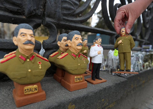 Souvenirs are displayed for sale at the museum of Soviet leader Joseph Stalin in his hometown of Gori, Georgia on March 1, 2023. (Photo by Irakli Gedenidze/Reuters)