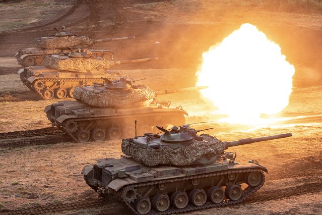 This handout photo taken and released by Taiwan's Ministry of National Defense on July 24, 2024 shows a Taiwanese US-made M60A3 tank firing its main gun during the annual Han Kuang military exercises on Taiwan's Penghu Islands. (Photo by Taiwan's Ministry of National Defense/Handout via AFP Photo)