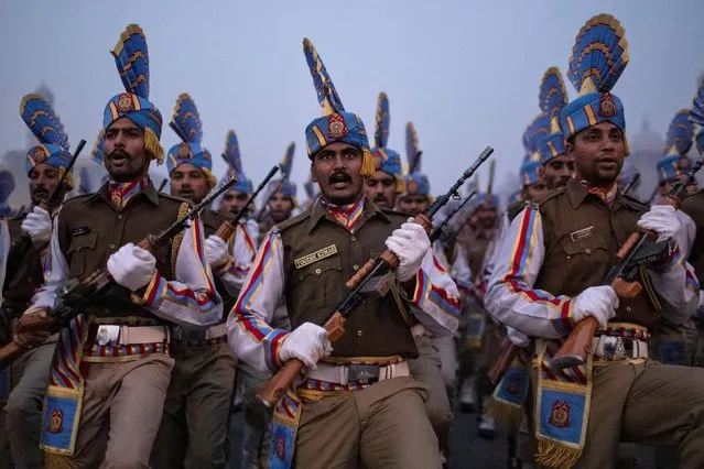 Soldiers take part in the rehearsal for the Republic Day parade early morning in New Delhi, India, January 13, 2020. (Photo by Danish Siddiqui/Reuters)