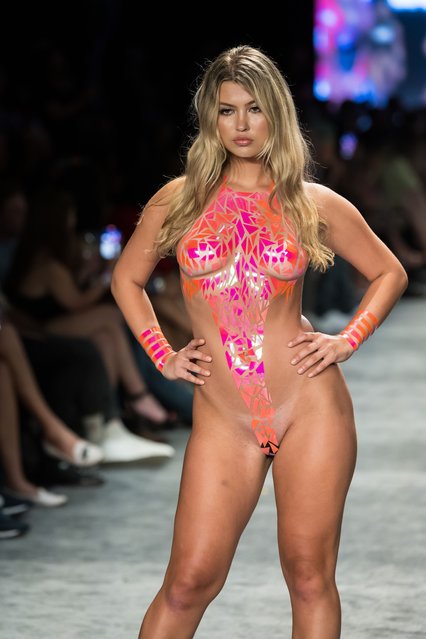 A model walks the runway wearing Black Tape Project during Miami Swim Week Powered By Art Hearts Fashion at Fountainbleau Miami Beach on July 07, 2023 in Miami Beach, Florida. (Photo by Jason Koerner/Getty Images)