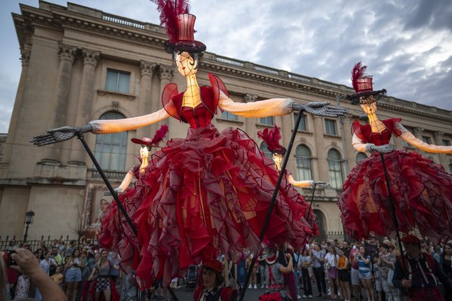 Artists of the French 20' Street Ballet performs during the B-FIT in the Street international festival in Bucharest, Romania, Sunday, July 2, 2023. The street theater festival took place over the weekend in the Romanian capital. (Photo by Vadim Ghirda)/AP Photo