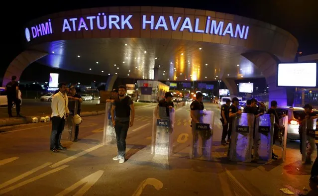 Police guard the entrance to Turkey's largest airport, Istanbul Ataturk, Turkey, following a blast June 28, 2016. (Photo by Osman Orsal/Reuters)
