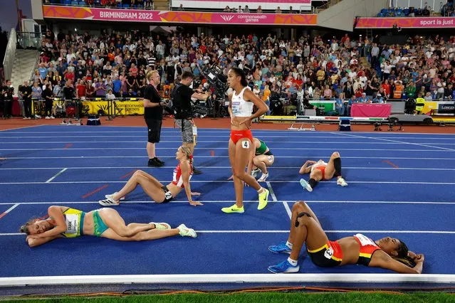 Katarina Johnson-Thompson of Team England recovers following the Women's Heptathlon 800m on day six of the Birmingham 2022 Commonwealth Games at Alexander Stadium on August 03, 2022 in Birmingham, England. (Photo by Tom Jenkins/The Guardian)