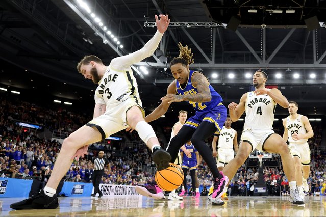 Braden Smith #3 of the Purdue Boilermakers and Christian Shumate #24 of the McNeese State Cowboys look for the ball during the first half in the second round of the NCAA Men's Basketball Tournament at Amica Mutual Pavillion on March 22, 2025 in Providence, Rhode Island. (Photo by Emilee Chinn/Getty Images)