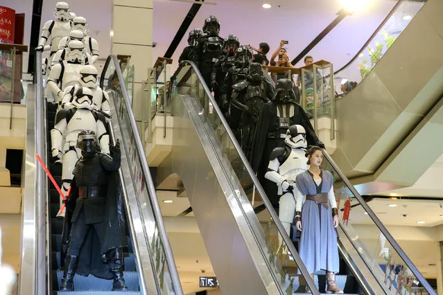 People dressed as characters from  Star Wars take part in an event held for the release of the film “Star Wars: The Last Jedi” in Bangkok, Thailand, December 13, 2017. (Photo by Athit Perawongmetha/Reuters)