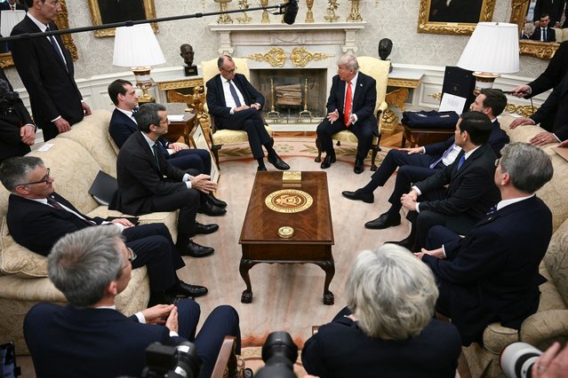 US President Donald Trump and German Chancellor Friedrich Merz meet during a bilateral meeting in the Oval Office of the White House in Washington, DC, on June 5, 2025. A month into his job, the conservative Merz, 69, will try to build a rapport with the mercurial Trump as he seeks to maintain good ties with the country he considers post-war Germany's “indispensable” ally. (Photo by Brendan Smialowski/AFP Photo)