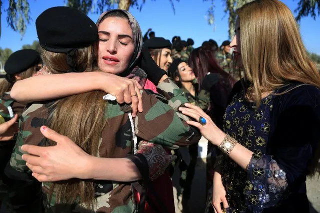 Female Peshmerga officers celebrate after their graduation ceremony, at Zakho military academy in Zakho town, Dohuk, Kurdistan Region in Iraq, 30 January 2018. (Photo by Gailan Haji/EPA/EFE)
