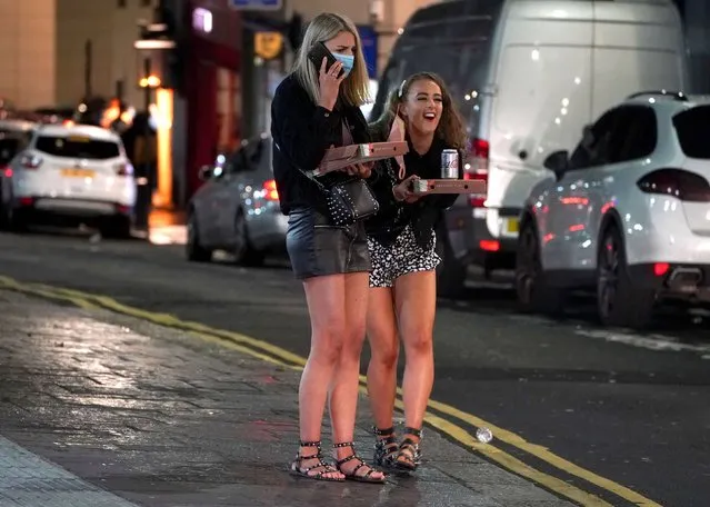 People out socialising in Newcastle city centre on October 10, 2020, ahead of the 10pm curfew that pubs and restaurants are subject to in order to combat the rise in coronavirus cases in England. Cities in northern England and other areas suffering a surge in Covid-19 cases may have pubs and restaurants temporarily closed to combat the spread of the virus. (Photo by Owen Humphreys/PA Images via Getty Images)