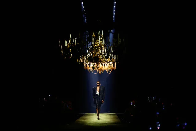 A model presents a creation by designer Anthony Vaccarello as part of his Fall-Winter 2023/2024 Women's ready-to-wear collection show for fashion house Saint Laurent during Paris Fashion Week in Paris, France on February 28, 2023. (Photo by Sarah Meyssonnier/Reuters)