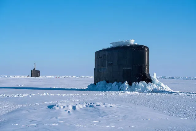 The Seawolf-class fast-attack submarine USS Connecticut and the Los Angeles-class fast-attack submarine USS Hartford break through the ice in support of Ice Exercise (ICEX) 2018 in the Beaufort Sea, March 10, 2018. Picture taken March 10, 2018. (Photo by Mass Communication 2nd Class Micheal H. Lee/Reuters/U.S. Navy)