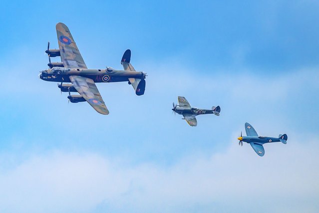 The picture dated September 27, 2025 shows the RAF BBMF three-ship, comprising of a BBMF Lancaster and two Spitfires, displaying at the annual BBMF Members Day at RAF Coningsby in Lincolnshire, UK. This is the penultimate weekend for displays with both teams due to display at next weekend's Duxford Flying Finale in Cambridgeshire. (Photo by Caroline Haycock/Bav Media)