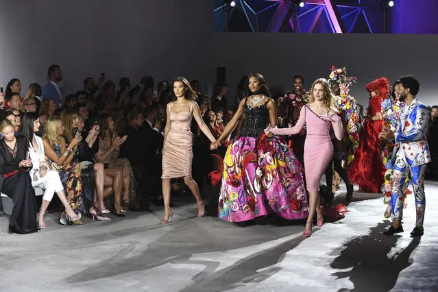 Models Bella Hadid, from centre left, Naomi Campbell and Natalia Vodianova walk the runway at the Fashion For Relief 2018 event during the 71st international film festival, Cannes, southern France, Sunday, May 13, 2018. (Photo by Arthur Mola/Invision/AP Photo)