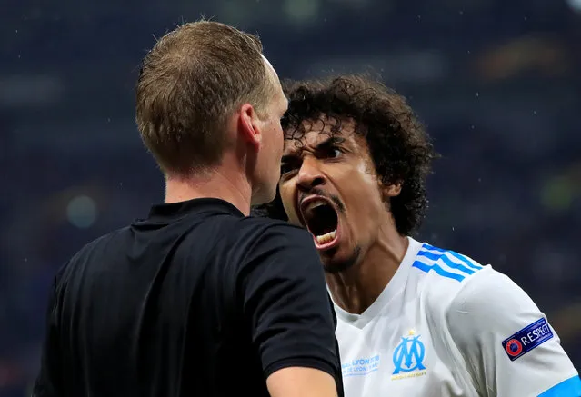 Luiz Gustavo of Olympique Marseille, referee Bjorn Kuipers during the UEFA Europa League match between Olympique Marseille v Atletico Madrid at the Parc Olympique Lyonnais on May 16, 2018 in Lyon France. (Photo by Gonzalo Fuentes/Reuters)