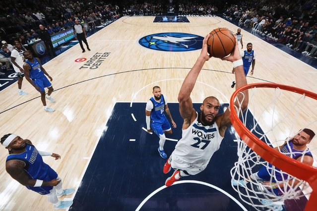 Minnesota Timberwolves center Rudy Gobert goes up for a dunk during an NBA game against the Dallas Mavericks on Monday, November 17, 2025. (Photo by Abbie Parr/AP Photo)