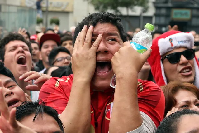 Peru fans react at the end of the Russia 2018 World Cup Group C football match between France and Peru at the Ekaterinburg Arena in Ekaterinburg on June 21, 2018. (Photo by Guadalupe Pardo/Reuters)