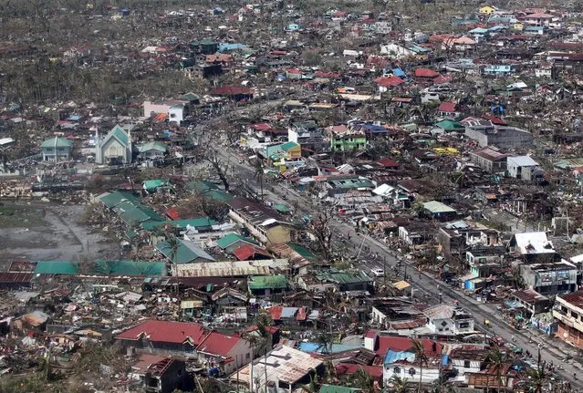 This handout photograph taken on November 10, 2013 and released by the Malacanang Photo Bureau (MPB) shows an aerial view of the damage in Leyte following Super Typhoon Haiyan in the area. The death toll from a super typhoon that decimated entire towns in the Philippines could soar well over 10,000, authorities warned Sunday, making it the country's worst recorded natural disaster