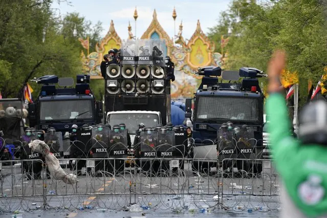 Police are seen during an anti-government march from Democracy Monument to Government House, in Bangkok, Thailand, July 18, 2021. (Photo by Chalinee Thirasupa/Reuters)