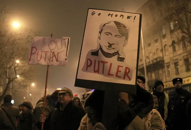 Supporters of Egyutt (Together) opposition party attend a rally to protest against the visit of Russian President Vladimir Putin in Budapest, Hungary, February 2, 2017. (Photo by Bernadett Szabo/Reuters)