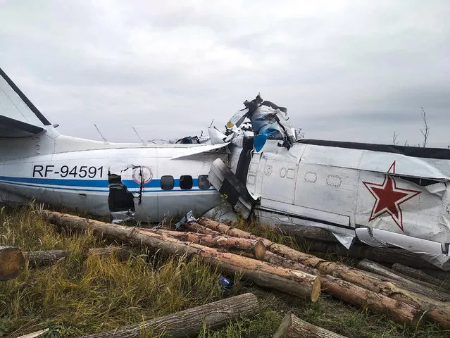 This photo provided by the Russian Emergency Situations Ministry press service shows the L-410, a Czech-made twin-engine turboprop, crashed near the town of Menzelinsk, about 960 kilometers (600 miles) east of Moscow, Russia, Sunday, October 10, 2021. A plane carrying skydivers crashed Sunday shortly after takeoff in central Russia, reportedly killing 15 of the 22 people aboard. The L-410, a Czech-made twin-engine turboprop, crashed near Menzelinsk, about 960 kilometers (600 miles) east of Moscow (Photo by Ministry of Emergency Situations press service via AP Photo)
