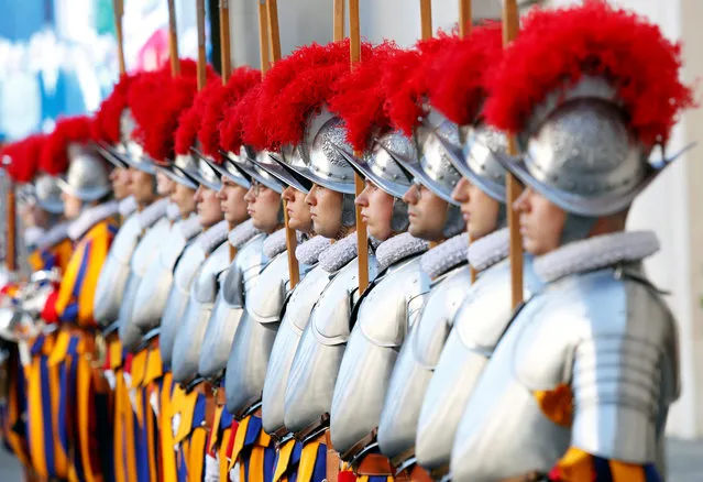 New recruits of the Vatican’s elite Swiss Guard attend the swearing-in ceremony at the Vatican, May 6, 2019. (Photo by Remo Casilli/Reuters)