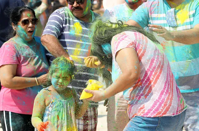 People celebrating Holi festival (festival of colours) held at Al Mamzar Beach Park in Dubai on March 5, 2024. Holi festival is on 8th march but people are celebrating on 5th and 12th march during the weekend. (Photo by Pawan Singh/The National)