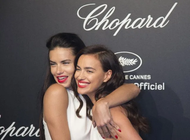 Models Adrianna Lima (L) and Irina Shayk pose during a photocall ahead of the Chopard Gold Party during the 68th Cannes Film Festival in Cannes, southern France, May 18, 2015. (Photo by Yves Herman/Reuters)