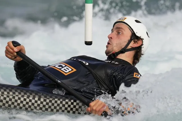 Britain's Adam Burgess paddles C1 on the course at Lee Valley Whitewater Centre in London, Wednesday, April 24, 2024. Britain's best canoe slalom athletes are set to embark on the 2024 international season which will culminate in the Olympic Games in July. World Champions Joe Clarke MBE, Mallory Franklin and Kimbeley Woods alongside Tokyo finalist Adam Burgess have already booked their spots at Paris 2024. (Photo by Kirsty Wigglesworth/AP Photo)