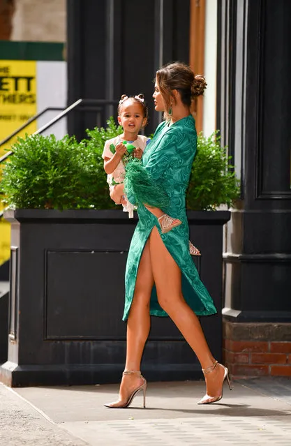 Chrissy Teigen and daughter Luna Stephens seen on the streets of Manhattan on June 24, 2019 in New York City. (Photo by James Devaney/GC Images)