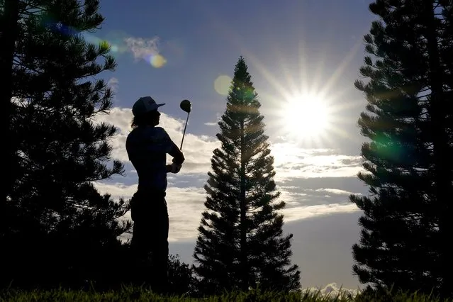 Cameron Smith plays his shot from the 18th tee during the third round of the Tournament of Champions golf event, Saturday, January 8, 2022, at Kapalua Plantation Course in Kapalua, Hawaii. (Photo by Matt York/AP Photo)