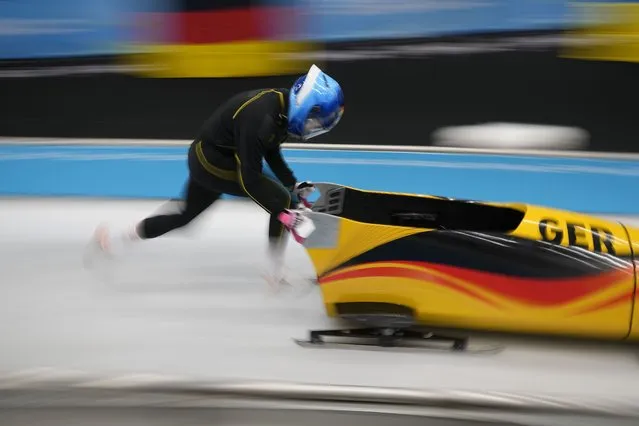 Laura Nolte of Germany starts during a women's monobob training heat at the 2022 Winter Olympics, Saturday, February 12, 2022, in the Yanqing district of Beijing. (Photo by Pavel Golovkin/AP Photo)