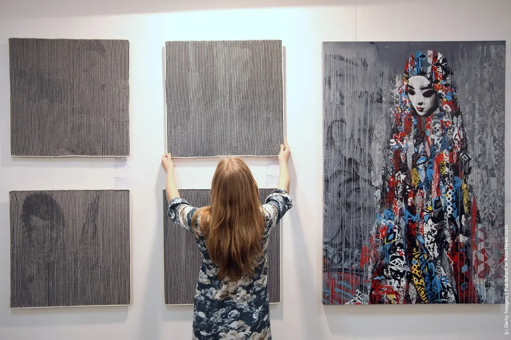 Artists And Galleries Advertise Their Artwork At The London Art Fair