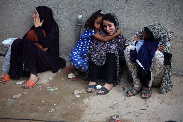 Palestinian women are reacting at the site of an Israeli strike on a house, in Nuseirat, central Gaza Strip, on July 17, 2024, amid the ongoing conflict between Israel and the Palestinian Hamas militant group. (Photo by Majdi Fathi/NurPhoto/Rex Features/Shutterstock)