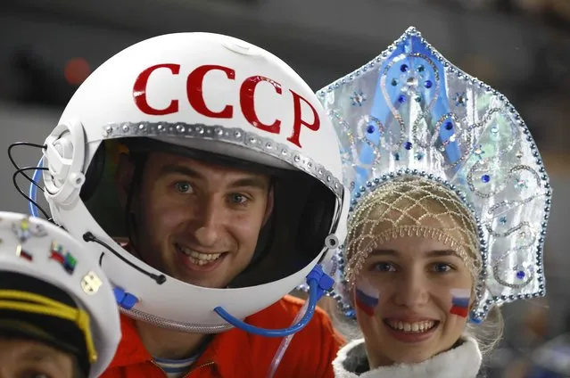 Ice Hockey, 2017 IIHF World Championship, Group A, Italy vs Russia , ologne, Germany on May 7, 2017. Russia's supporters, wearing the replica of a space helmet with the sign “USSR” and the Russian traditional headwear Kokoshnik, attend the game. (Photo by Wolfgang Rattay/Reuters)