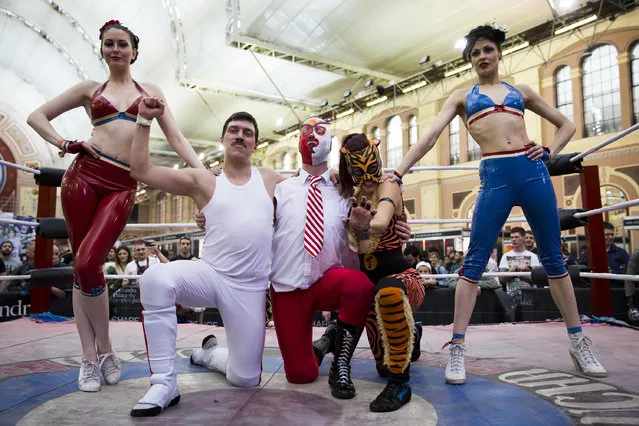 Lucha Britannia perform their Mexican wrestling routine at The Great British Tattoo Show at Alexandra Palace on May 24, 2014 in London, England. (Photo by Tristan Fewings/Getty Images for Alexandra Palace)