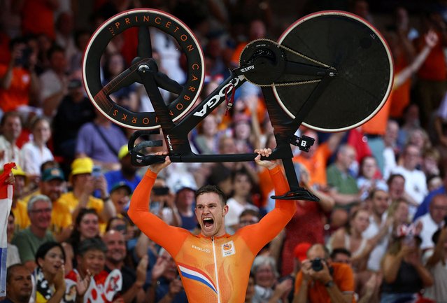 Gold medalist Harrie Lavreysen of Team Netherlands celebrates after the Men's Sprint, Finals on day fourteen of the Olympic Games Paris 2024 at Saint-Quentin-en-Yvelines Velodrome on August 09, 2024 in Paris, France. (Photo by Agustin Marcarian/Reuters)