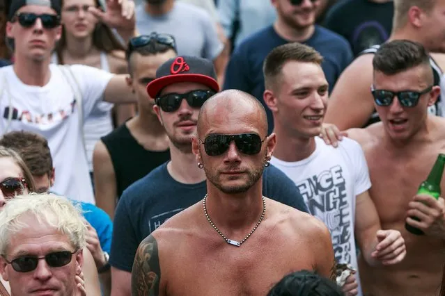 Participants attend the “Zug der Liebe” (The Love Train) techno and electronic music parade on July 25, 2015 in Berlin, Germany. The “Zug der Liebe” is the successor to the “Loveparade”, which in its heyday attracted up to 100,000 participants and ended in disaster and tragedy in 2010 when 21 people died and over 500 were injured due to suffocation from overcrowding at the “Loveparade” in Duisburg. (Photo by Carsten Koall/Getty Images)