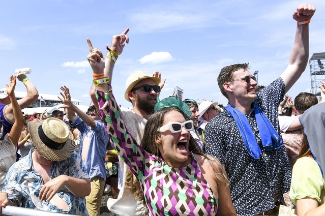 The crowd in the infield were having a great time during the 147th running of the Preakness Stakes at Pimlico Race Course in Baltimore on May 21, 2022. Photo by Jonathan Newton/The Washington Post)
