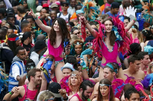 Revellers dance at the Notting Hill Carnival in west London, August 31, 2015. (Photo by Eddie Keogh/Reuters)