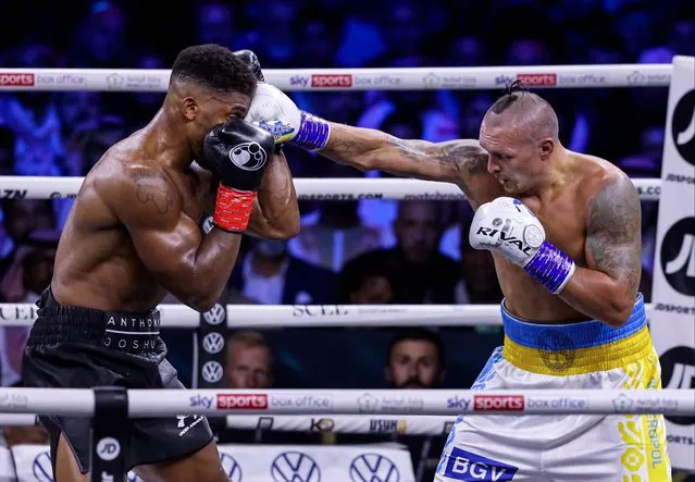 Oleksandr Usyk of Ukraine (R) in action against Anthony Joshua (L) of Great Britain during boxing rematch under the name of “Rage in the Red Sea” at King Abdullah Sports Complex in Jeddah, Saudi Arabia on August 20, 2022. (Photo by Ayman Yaqoob/Anadolu Agency via Getty Images)