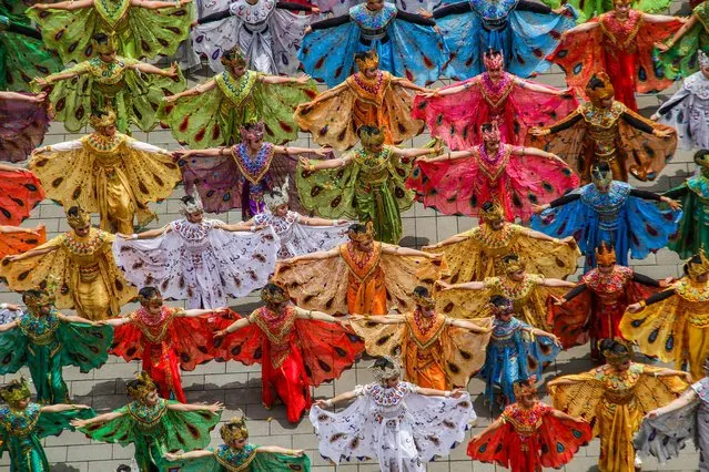 Aerial view show dancers take a part in mass traditional dance from West Java, Peacock Dance (Tari Merak) in Bandung on September 18, 2022. The cultural event, which was attended by artists and dancers from various regions in West Java, was held in commemoration of the International Day of Peace which falls on September 21 and as an effort, the Peacock Dance (Tari Merak) can be recognized by UNESCO as an intangible cultural heritage. (Photo by Algi Febri Sugita/ZUMA Press Wire/Rex Features/Shutterstock)