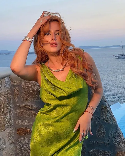 American actress and model Bella Thorne poses seductively against a rock in the first decade of October 2022. (Photo by bellathorne/Instagram)