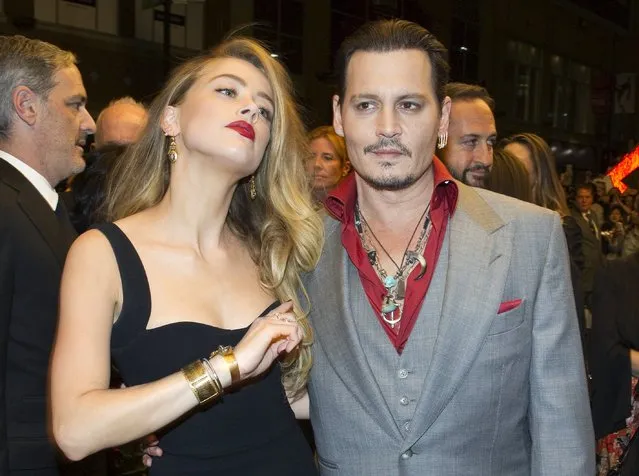 Actors Johnny Depp and his wife Amber Heard arrive for the premiere of the movie “Black Mass” at TIFF the Toronto International Film Festival in Toronto, September 14, 2015. (Photo by Fred Thornhill/Reuters)