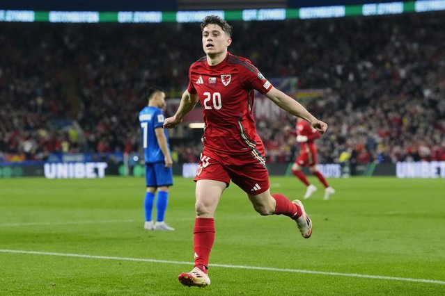 Wales' Daniel James celebrates scoring his sides first goal of the game during the 2026 FIFA World Cup Qualifying, Group J match at the Cardiff City Stadium on Saturday, March 22, 2025. (Photo by Nick Potts/PA Wire)