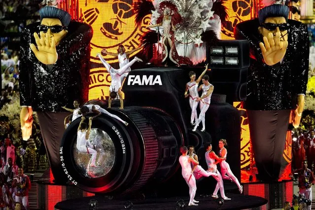 Performers from the Academicos do Salgueiro samba school parade during carnival celebrations at the Sambadrome in Rio.  (Photo by Photo by Felipe Dana/Associated Press)